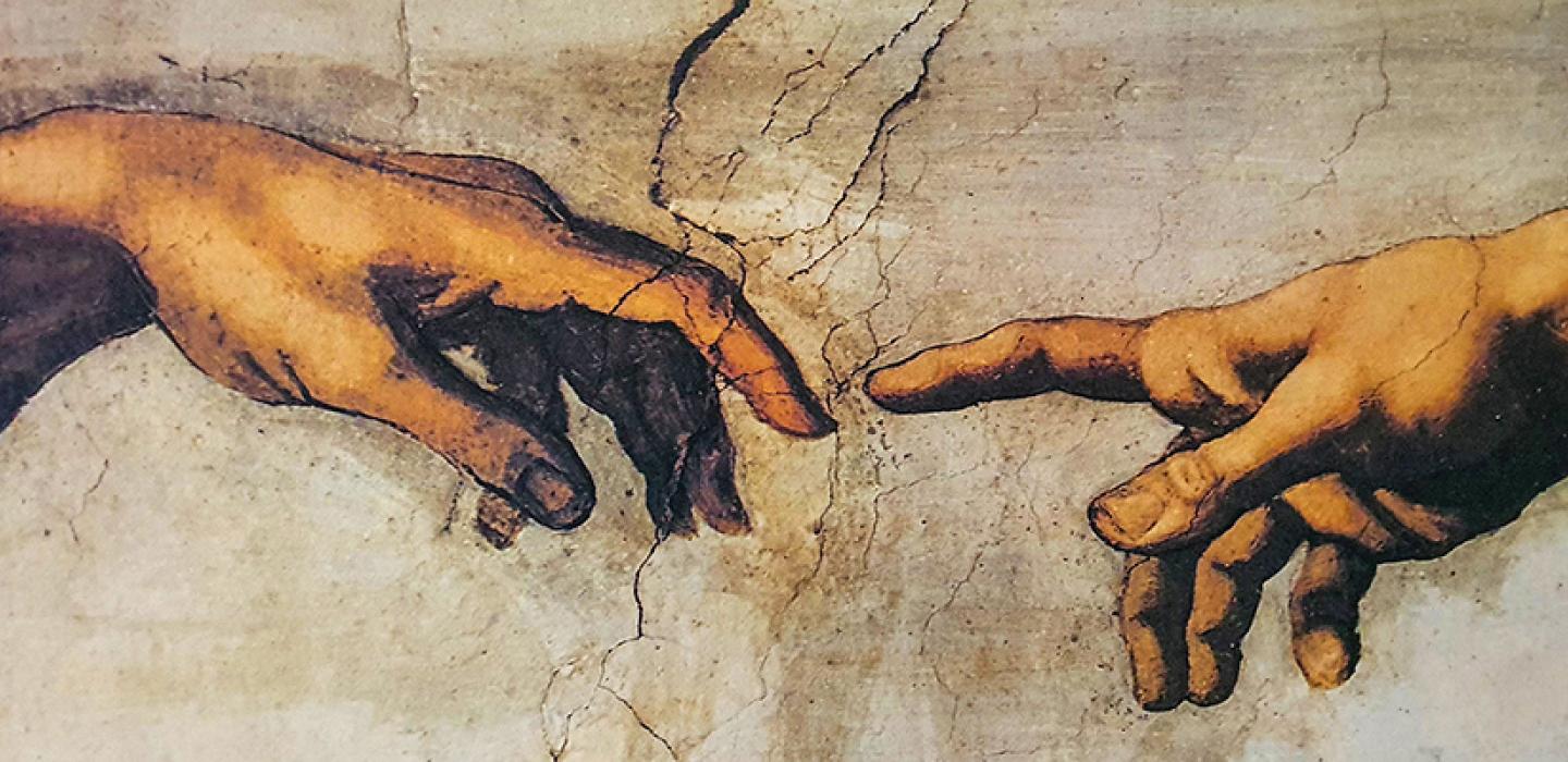 fingers touching painting